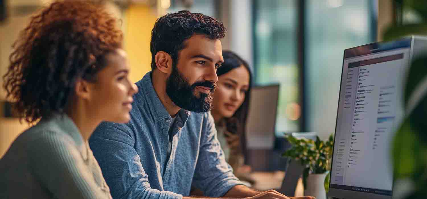 Business owner exploring IT support options with a technology consultant