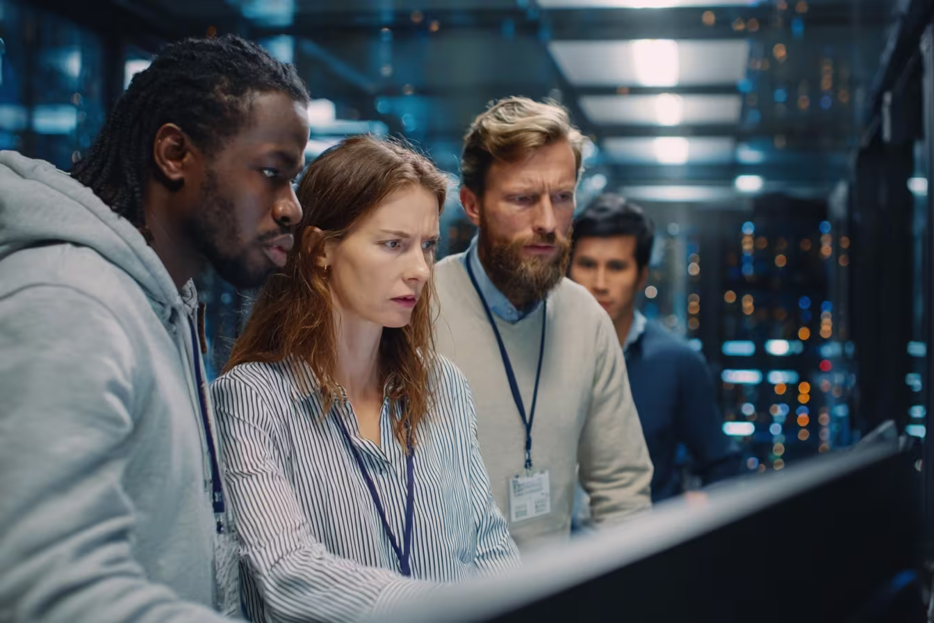Diverse IT team analyzing security services